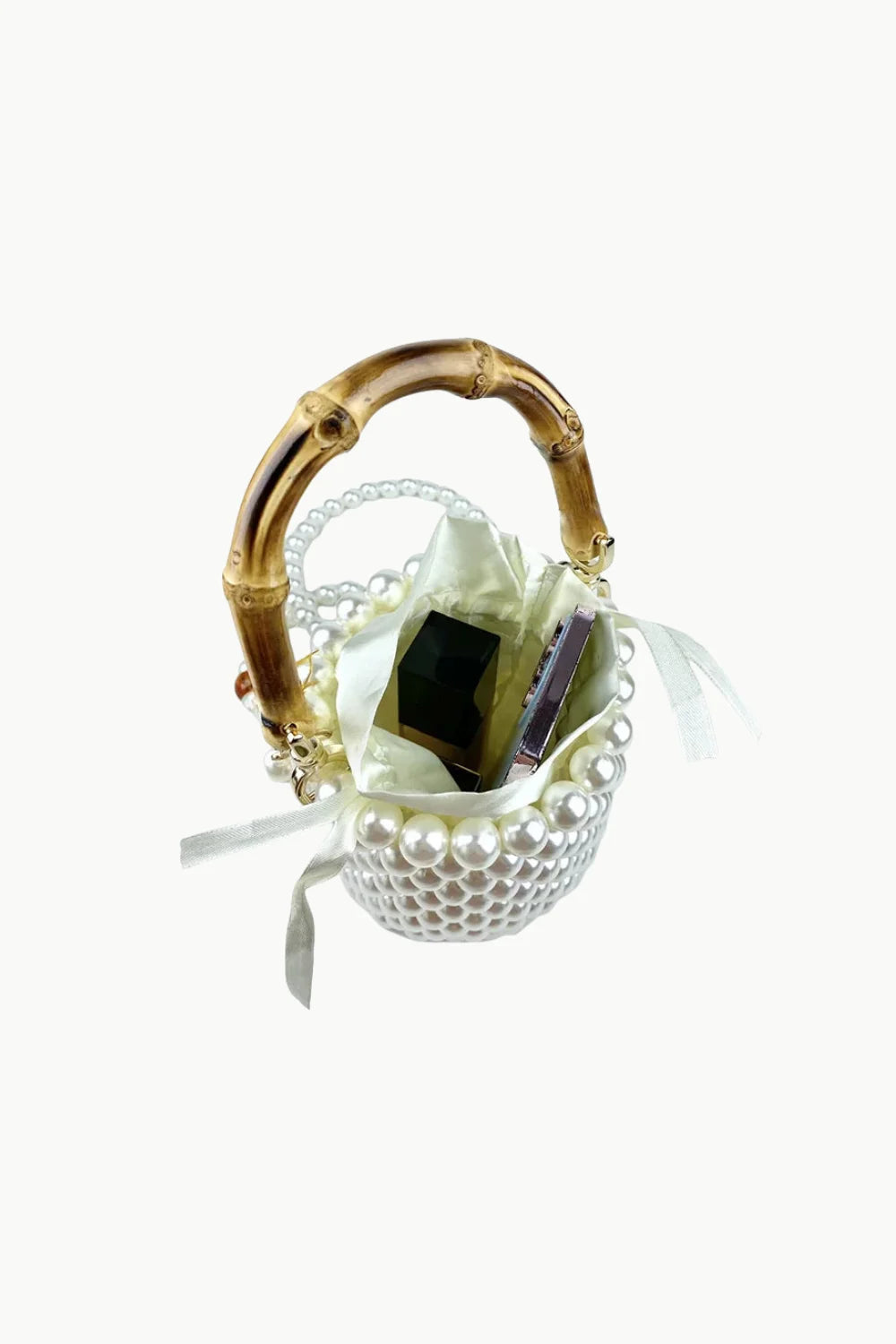 Bamboo Pearl Bucket Bag with pearl embellishments, bamboo handle, and satin lining