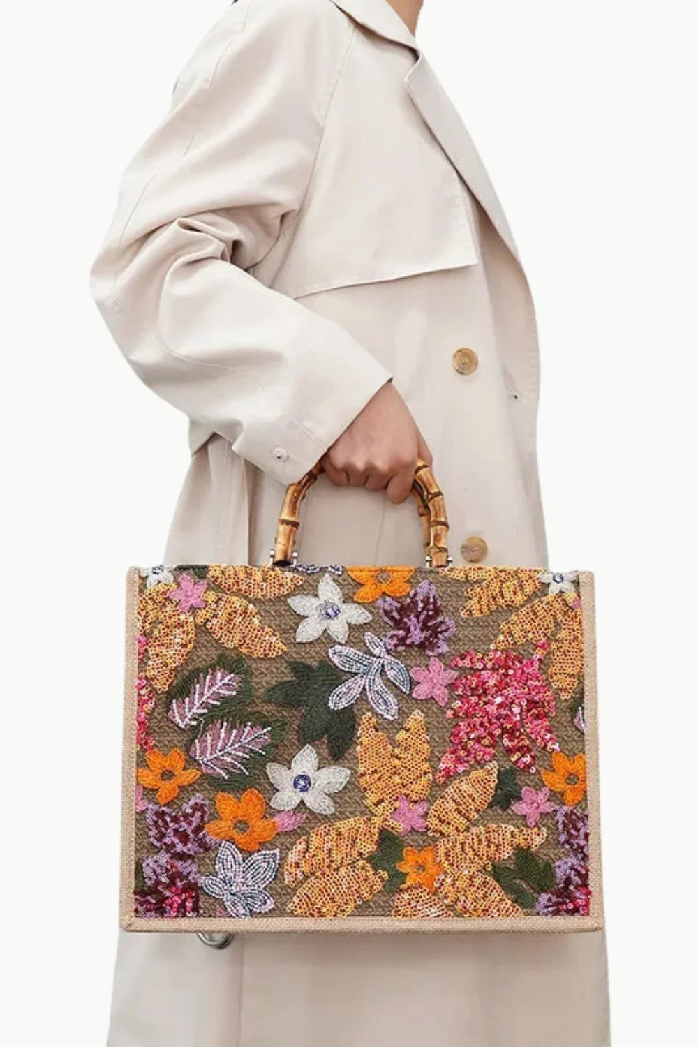 Floral embroidered tote bag with bamboo handles, part of the Wood Beaded Bag collection