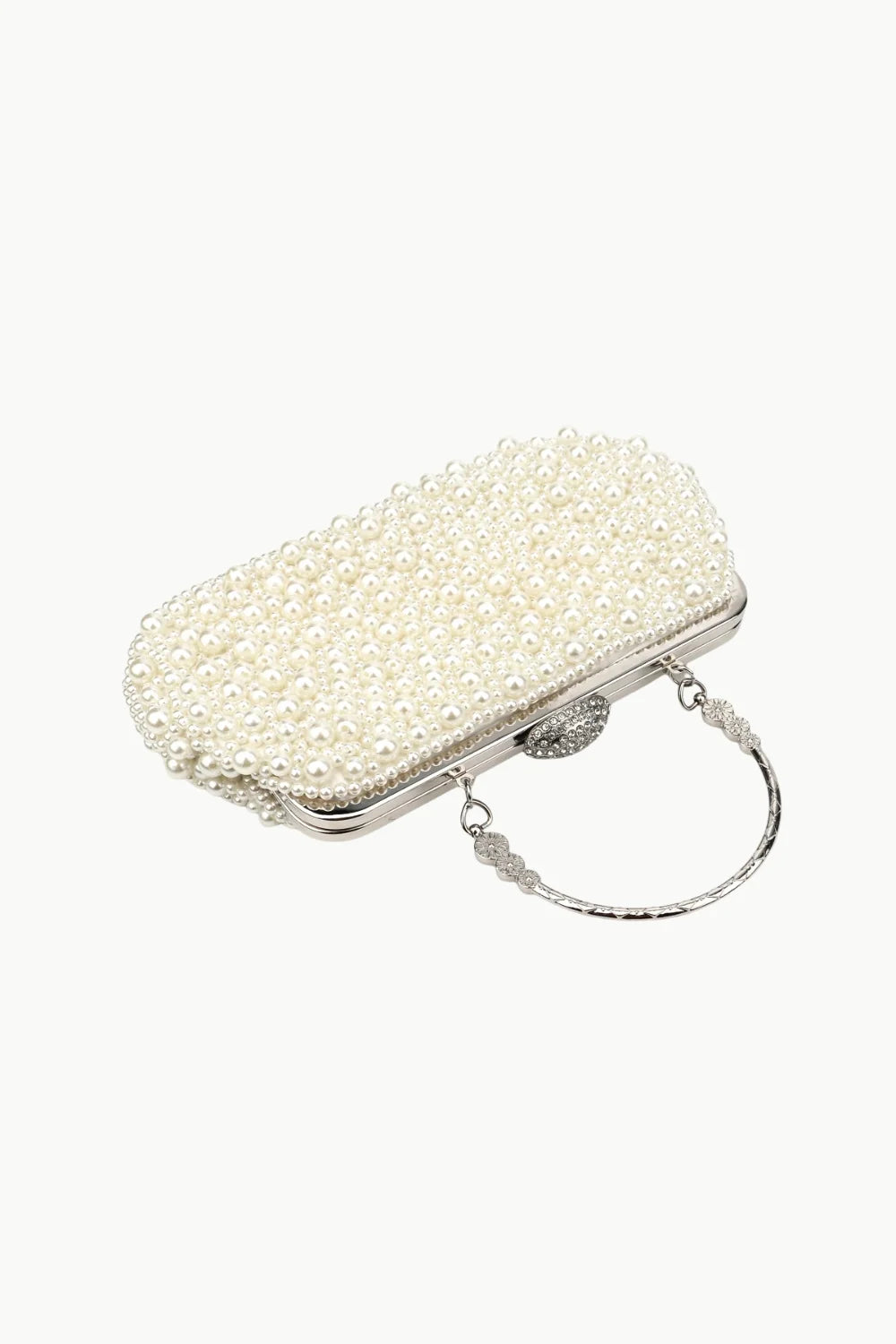 Pearl-embellished beaded clutch white with metal frame and handle for elegant occasions
