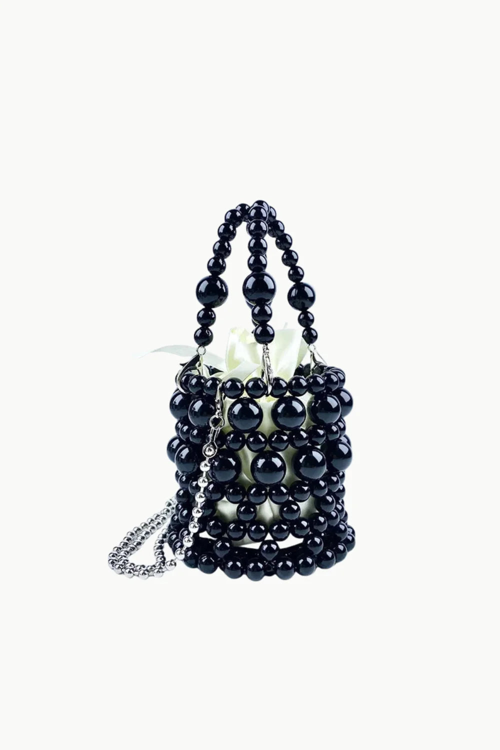 Black beaded bucket bag with white lining and silver chain strap for everyday style