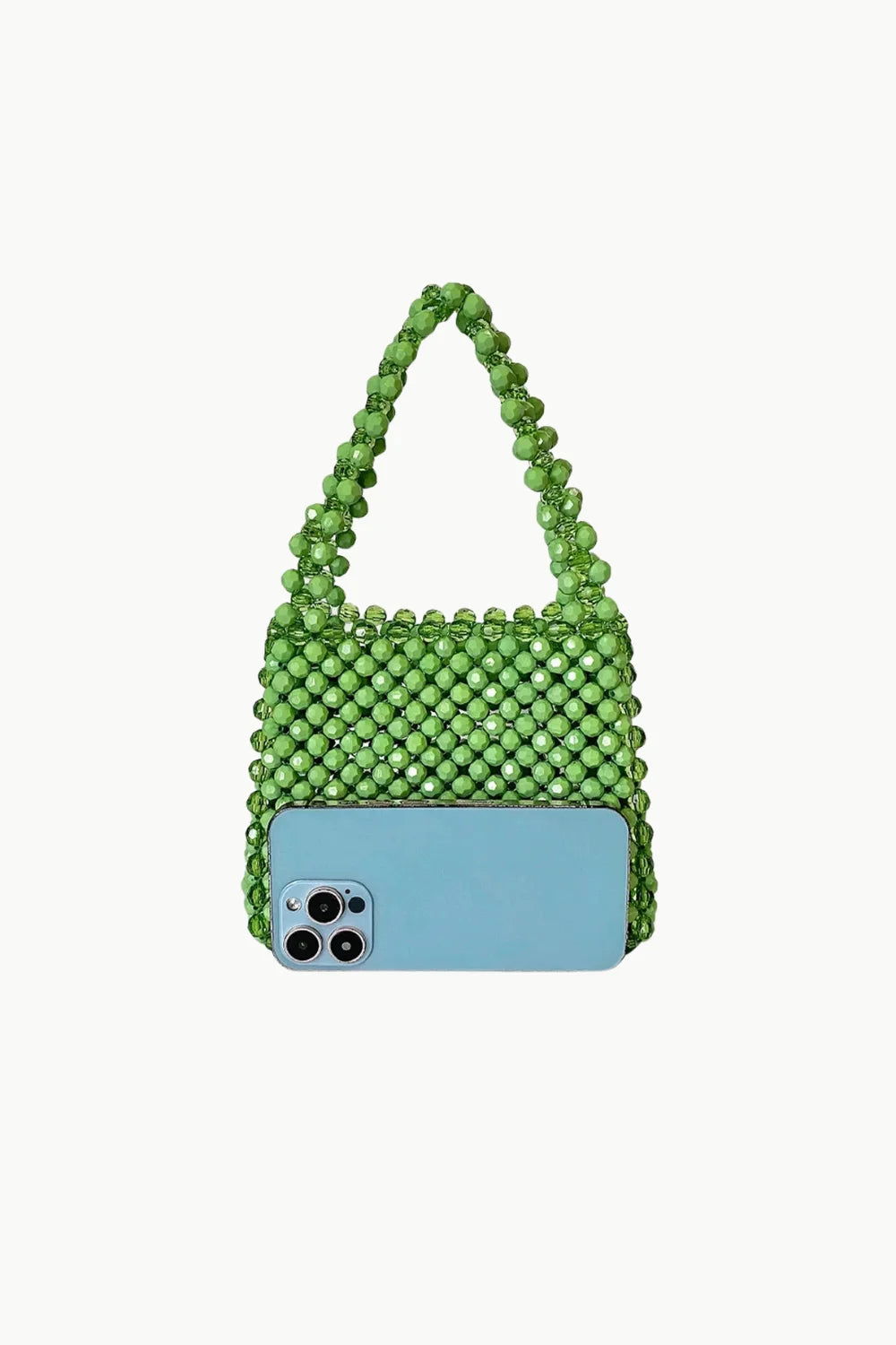 Green beaded handbag with light blue smartphone in front, stylish green beaded handbag