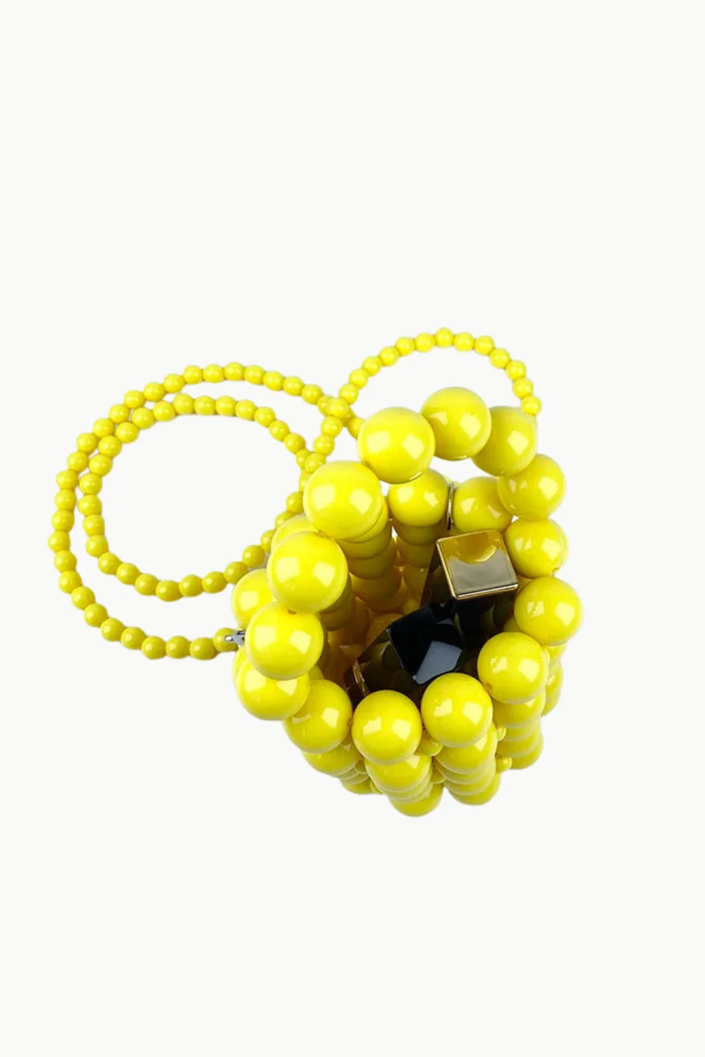 Vibrant yellow beaded bucket bag with dark interior and gold clasp for style