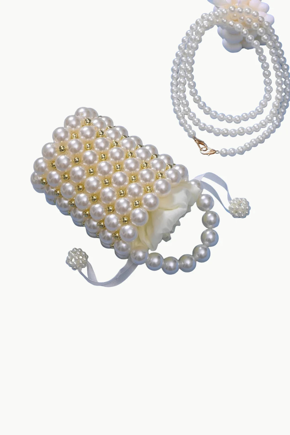 Pearl bucket bag with pearl-beaded drawstring pouch and matching pearl necklace