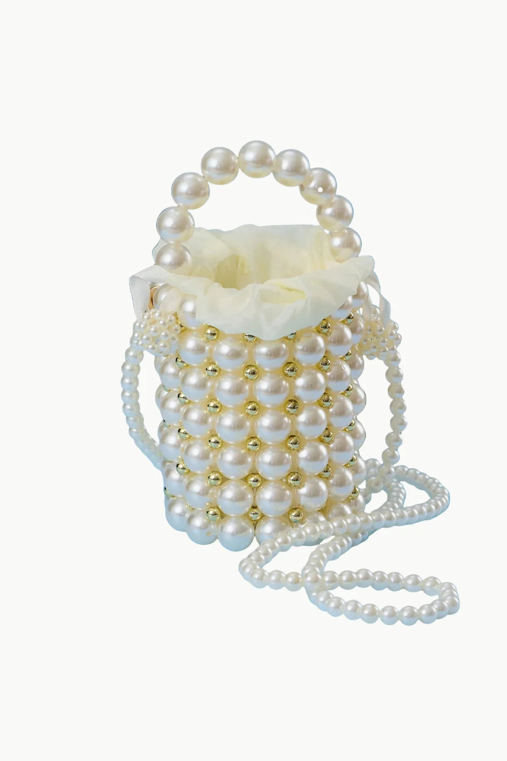 Pearl bucket bag with cylindrical shape, top handle, and long shoulder strap