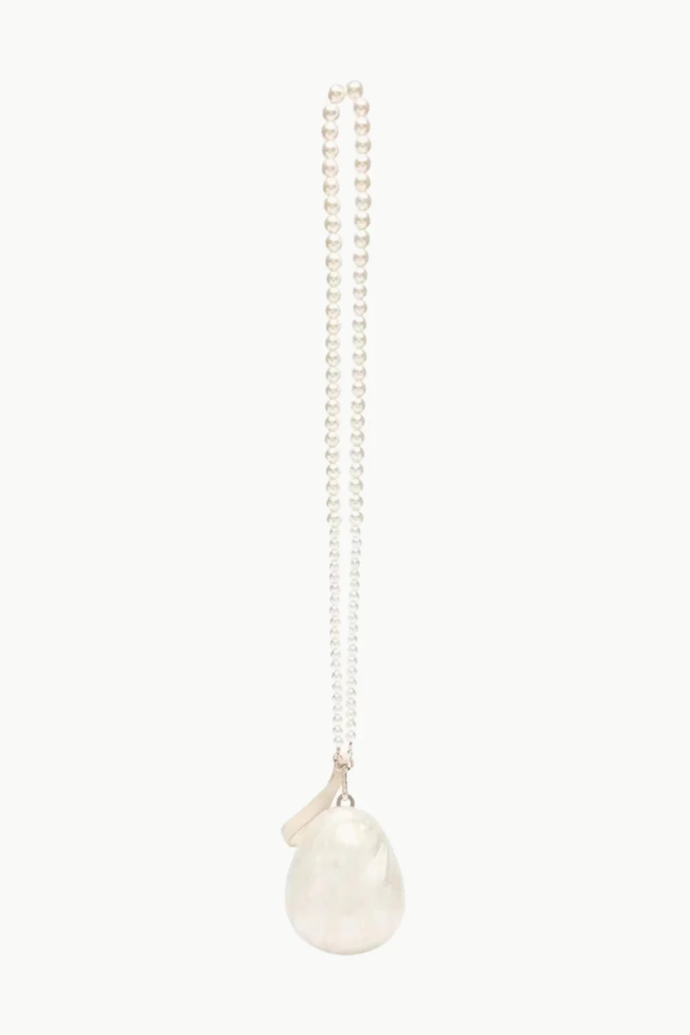 White pearl drop pendant necklace with pearl embellished spherical design on embellished spherical bag