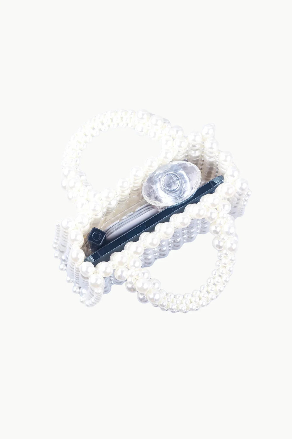 White beaded Pearl Hand Bag with clear perfume bottle and black item inside