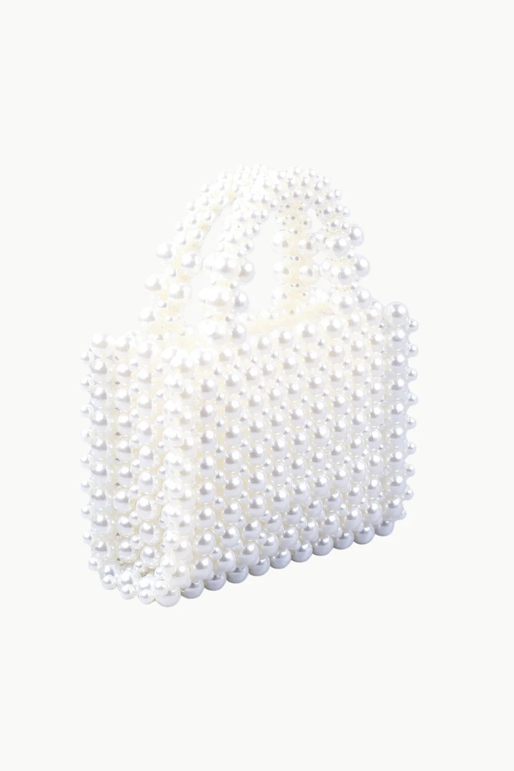 White pearl-beaded top-handle bag showcasing elegant pearl hand bag design
