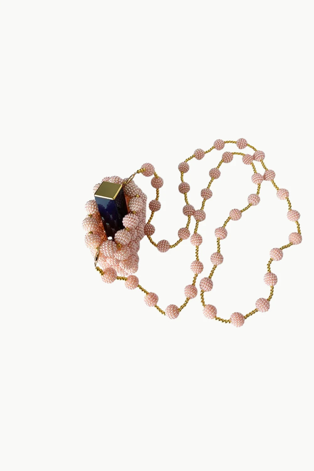 Pink beaded rosary beads with dark blue and gold pendant on Pink Beaded Mini Bag