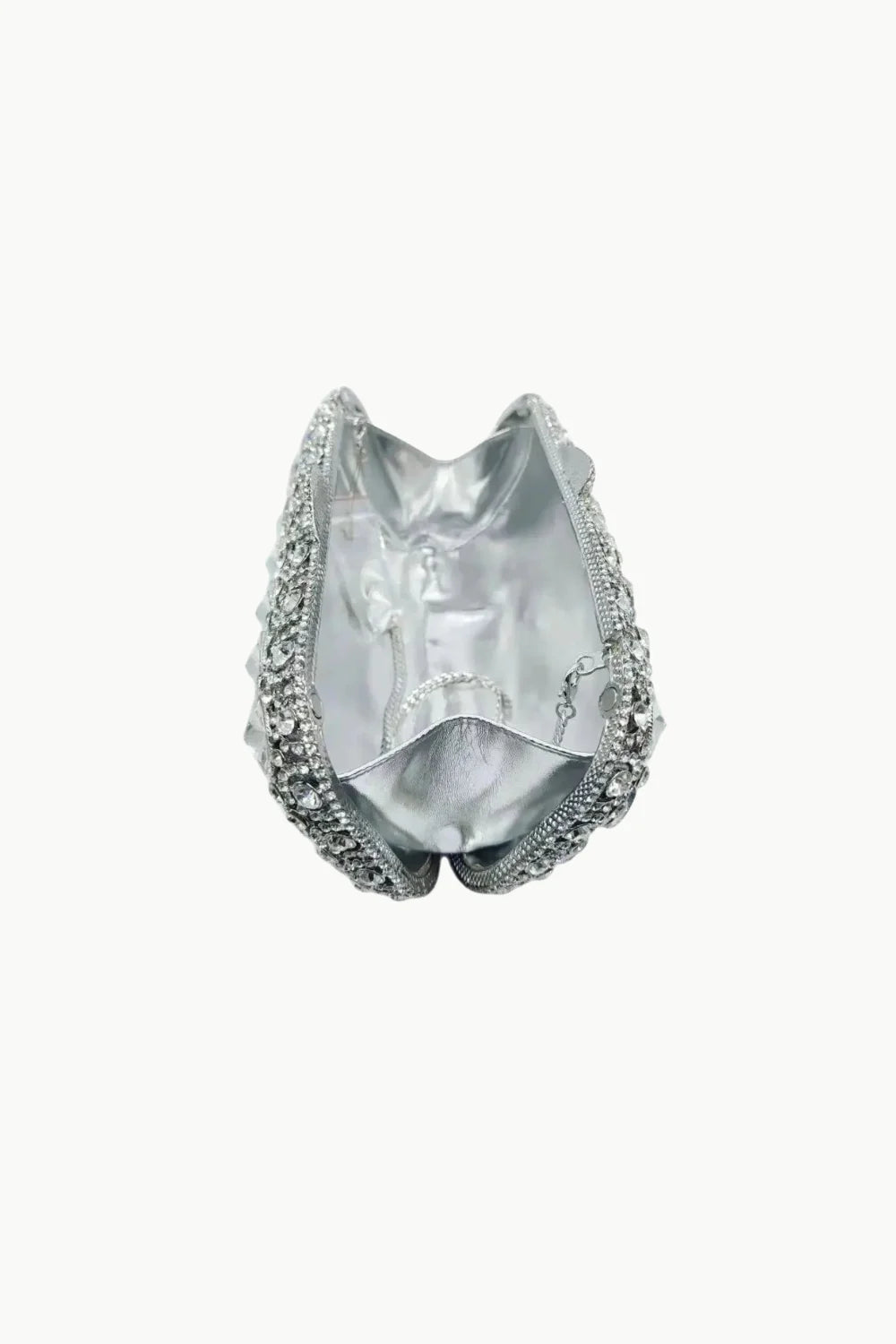 Open silver clutch purse with rhinestones and chain handle, perfect as a purple beaded evening bag