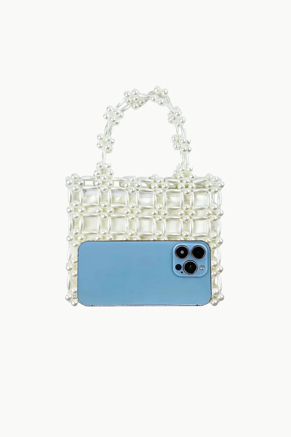 White beaded handbag with floral handle design, perfect as a square beaded bag accessory