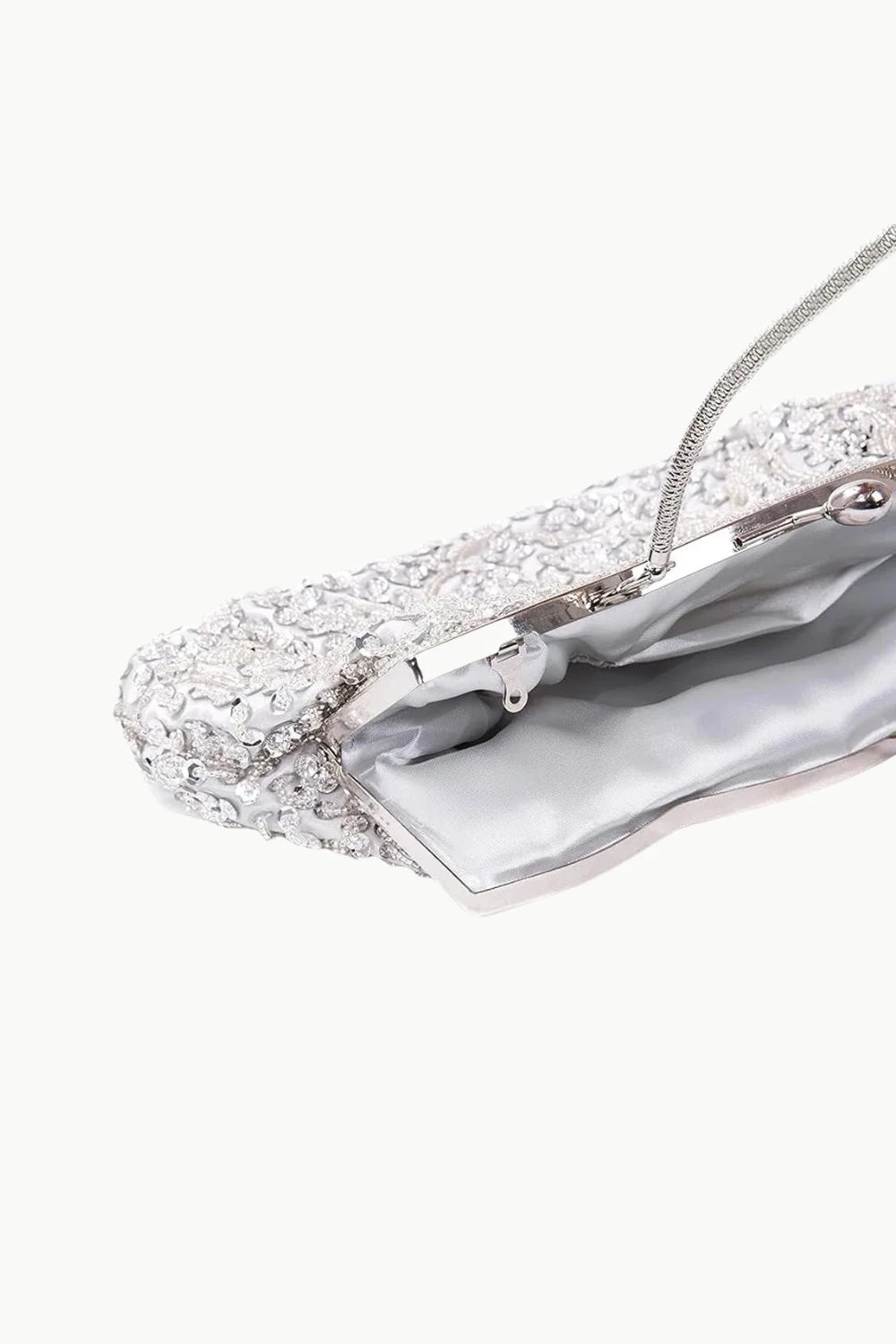 Vintage beaded bag with silver clutch, sequins, and chain strap for elegant style