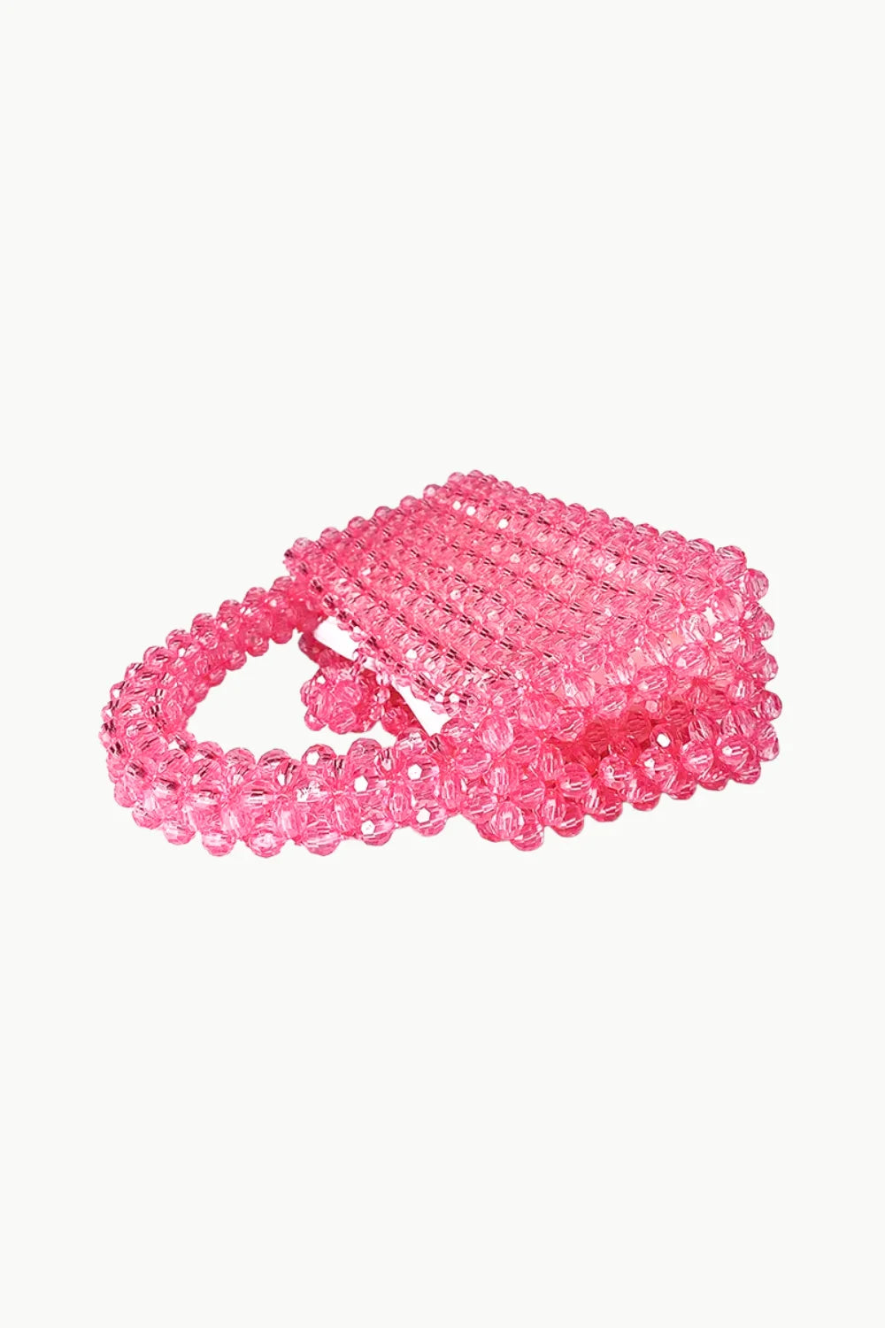 Pink beaded handbag with a rectangular shape and top handle, perfect as a white beaded purse