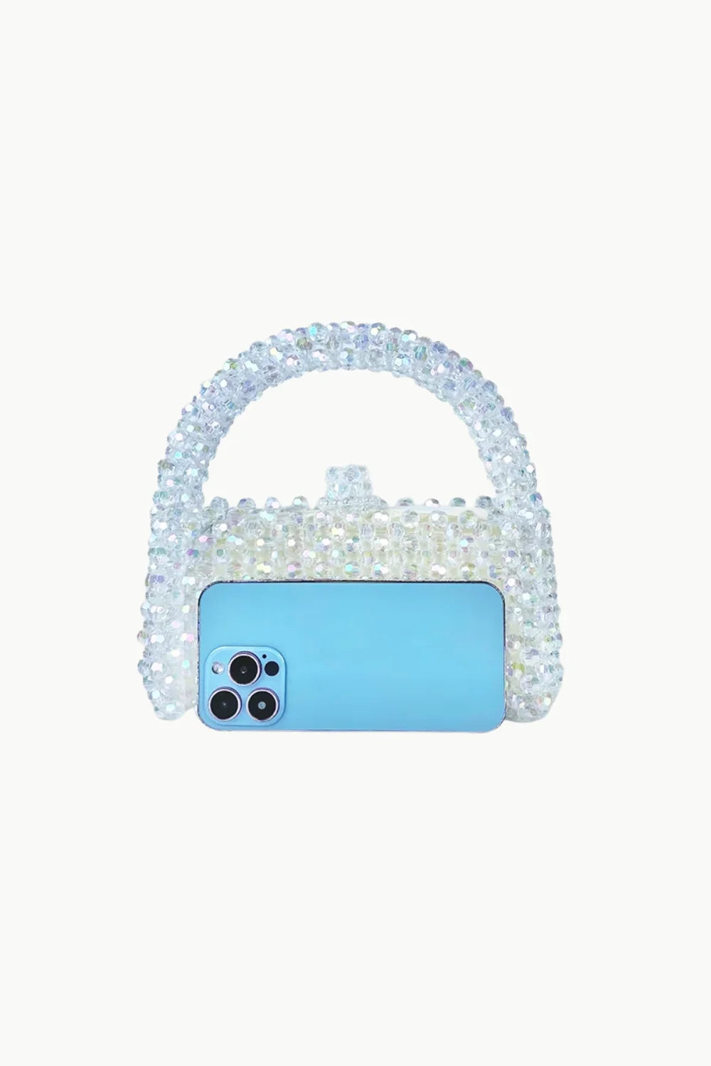 White beaded purse with transparent beads and light blue smartphone in front