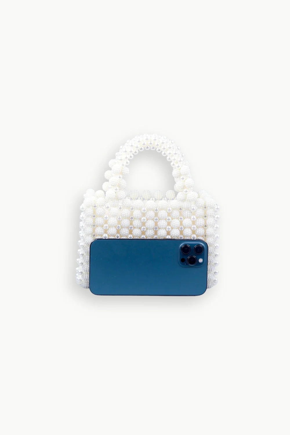 White beaded mini tote bag with blue smartphone, stylish women’s beaded bag accessory