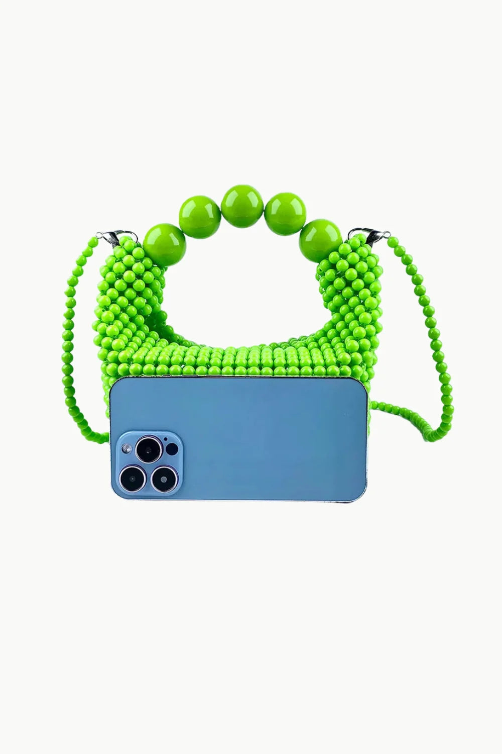 Vibrant green beaded handbag with arched handle and blue smartphone, yellow beaded handbag style