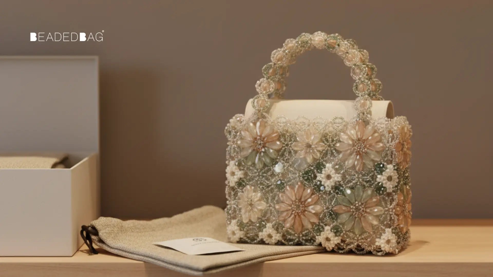 Beaded handbag stored neatly on a shelf with dust bag and insert, in soft natural studio lighting.
