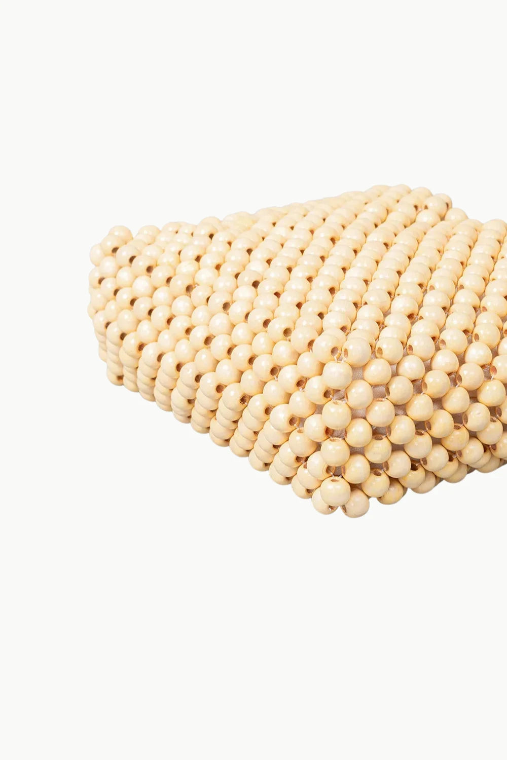 Light-colored wooden beaded car seat cushion from the 70s Wooden Beaded Bag collection