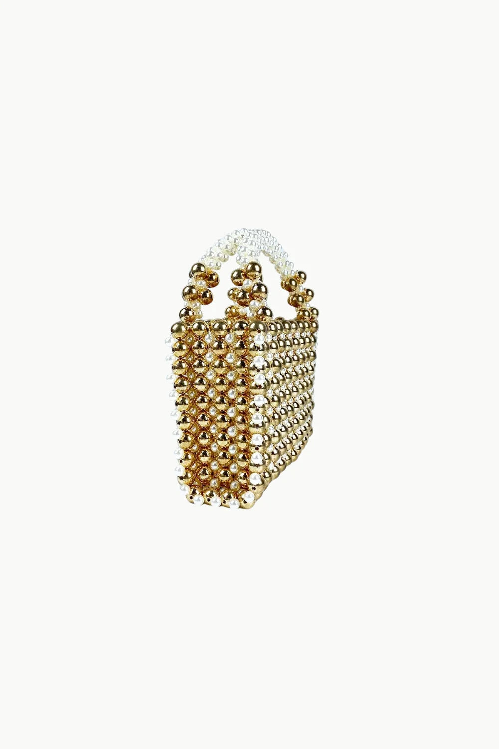 Gold beaded handbag with white handles showcasing Art Deco beaded purse design