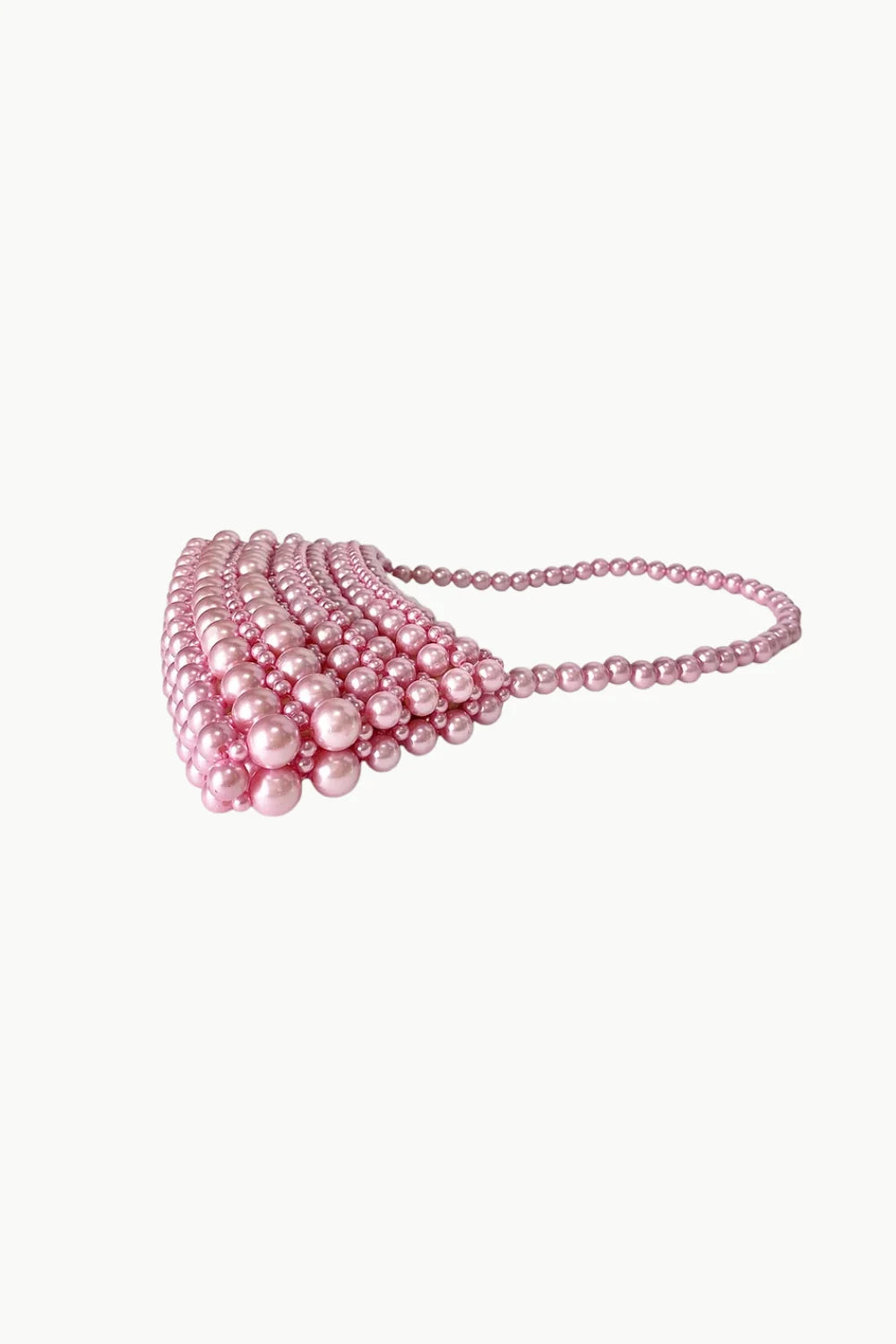 Baby pink beaded bag with pearl handle and pink beaded detailing for elegant style