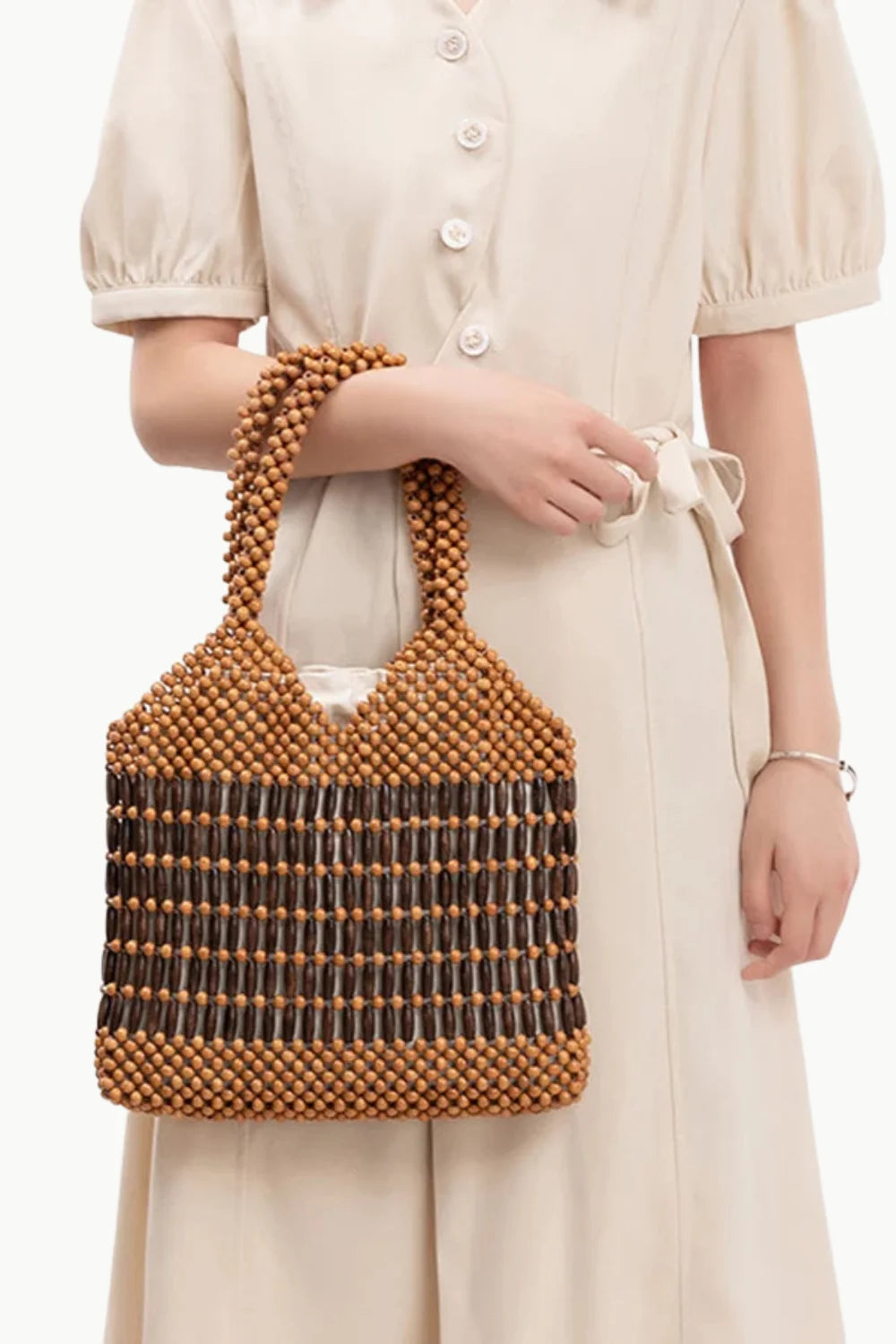 Light brown Wooden Beaded Handbag with dark brown vertical accents made of wooden beads