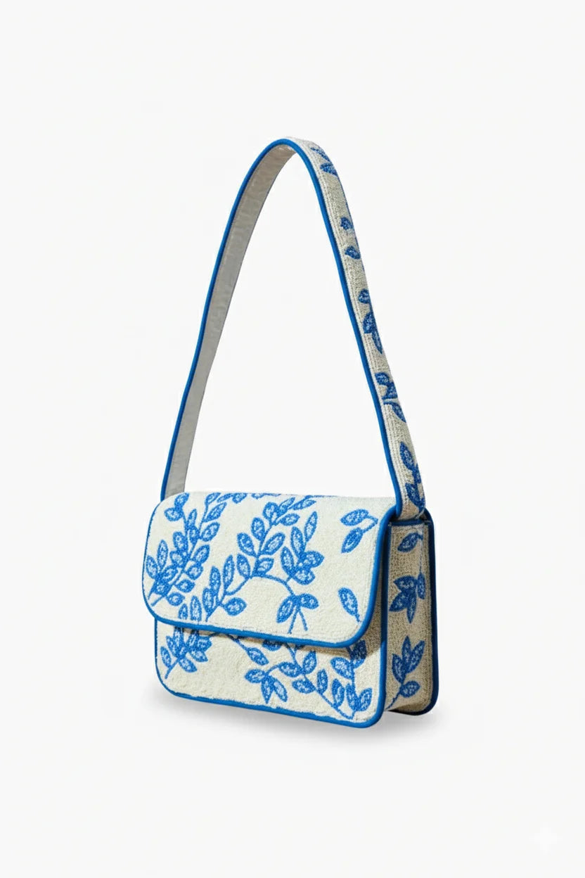 White shoulder bag with blue leaf embroidery, a stylish beaded handbag for womens accessory