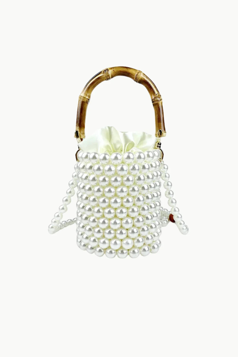 White pearl bucket bag with bamboo top handle, stylish bamboo pearl bucket accessory