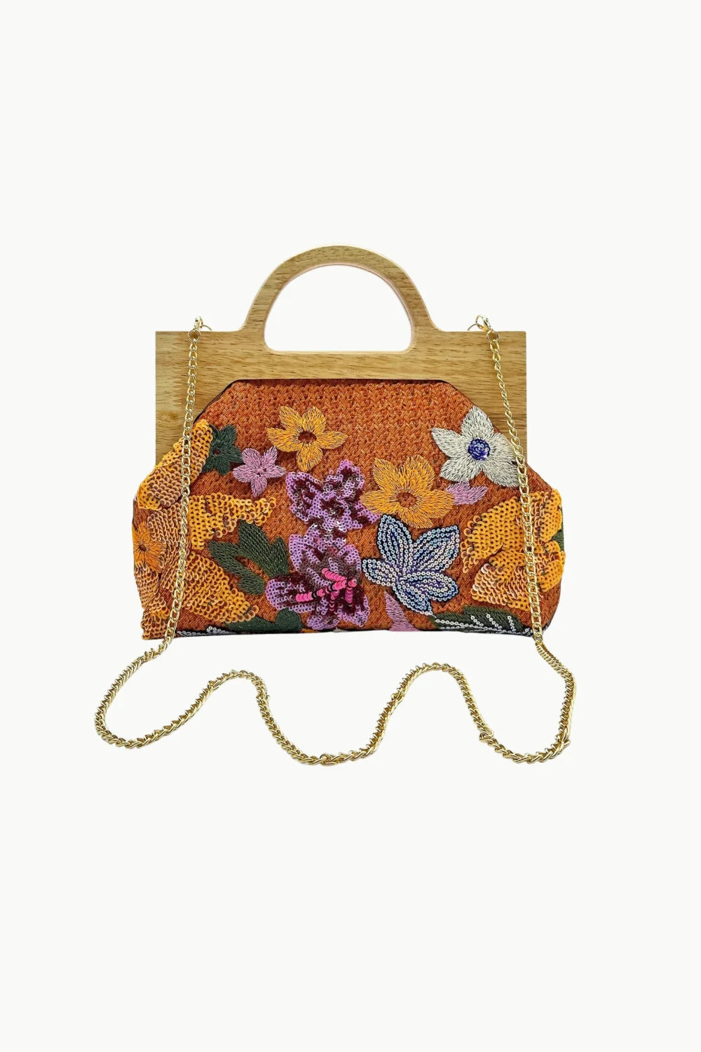 Orange beaded crossbody bag with wooden handles, floral embellishments, and gold chain strap