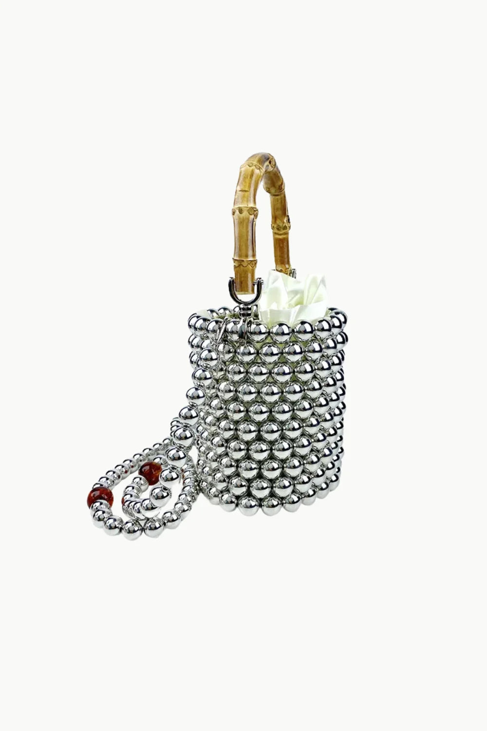 Silver beaded crossbody bucket bag with bamboo handle and red accents