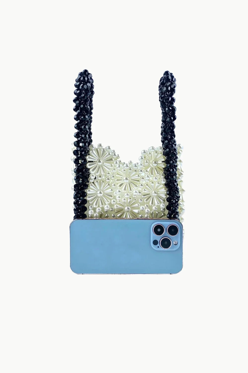 Light blue smartphone with beaded flower purse strap featuring a beaded flower design