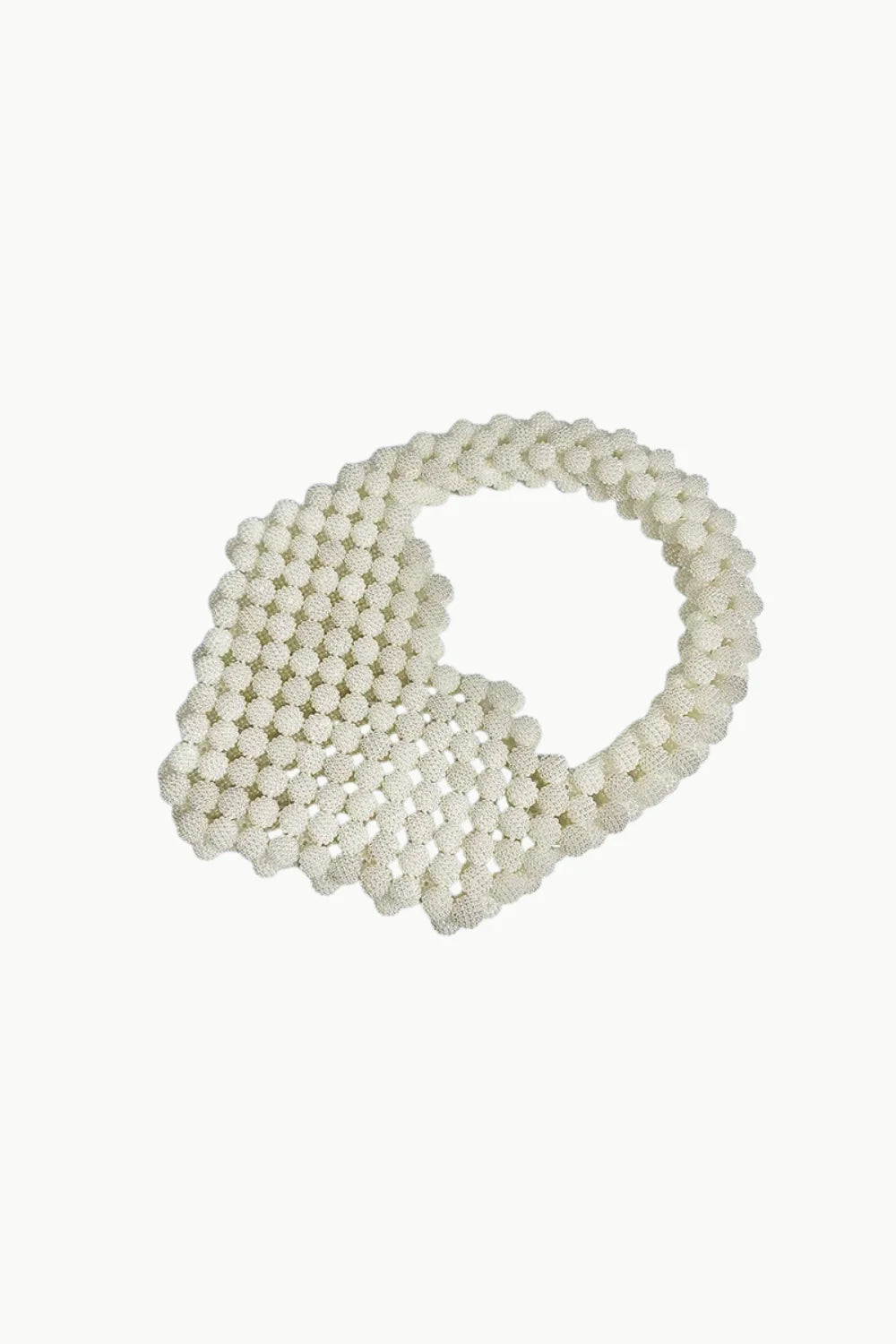 White beaded heart purse with rounded handle, perfect for stylish accessories