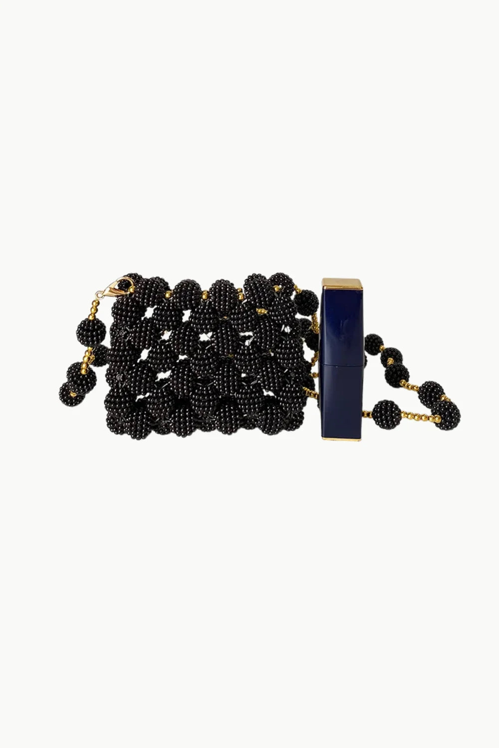 Black beaded knoted mini bag with navy clasp and gold chain detail for stylish mini bag look