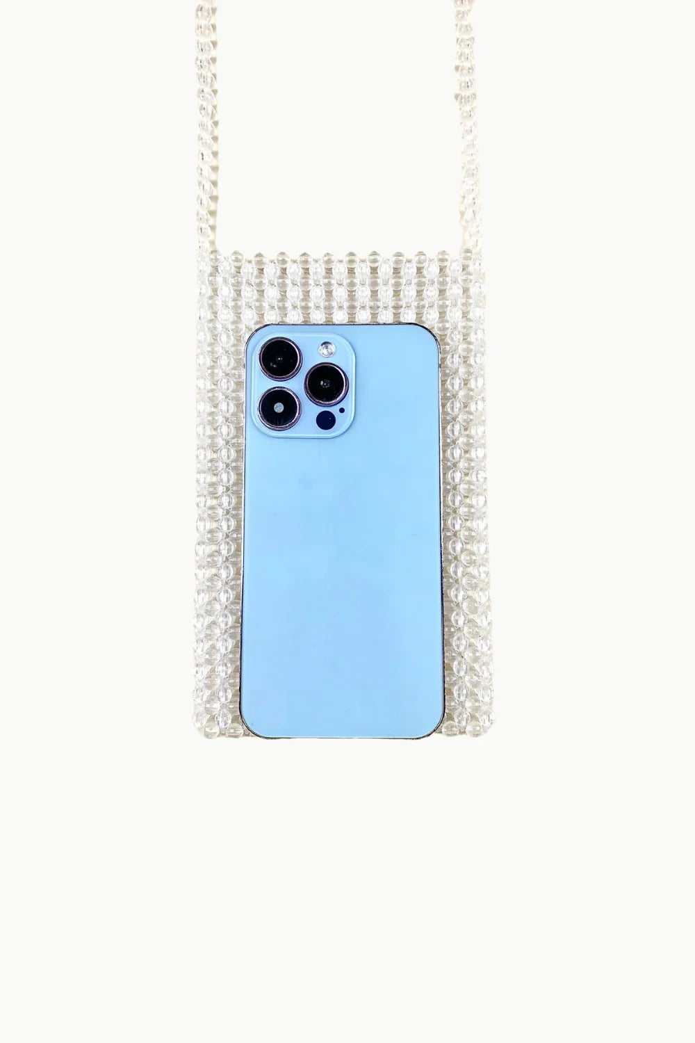 Pearl-beaded phone strap crossbody bag with light blue smartphone inside