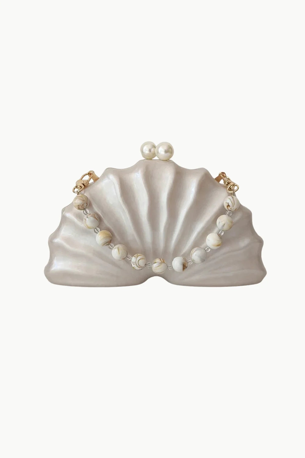 Pearlescent white seashell-shaped clutch with pearl clasp and beaded shell bag strap