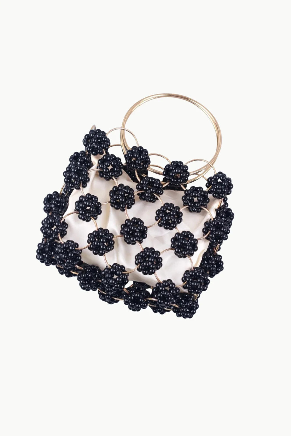 Black beaded bucket bag with circular metal handles and white satin lining