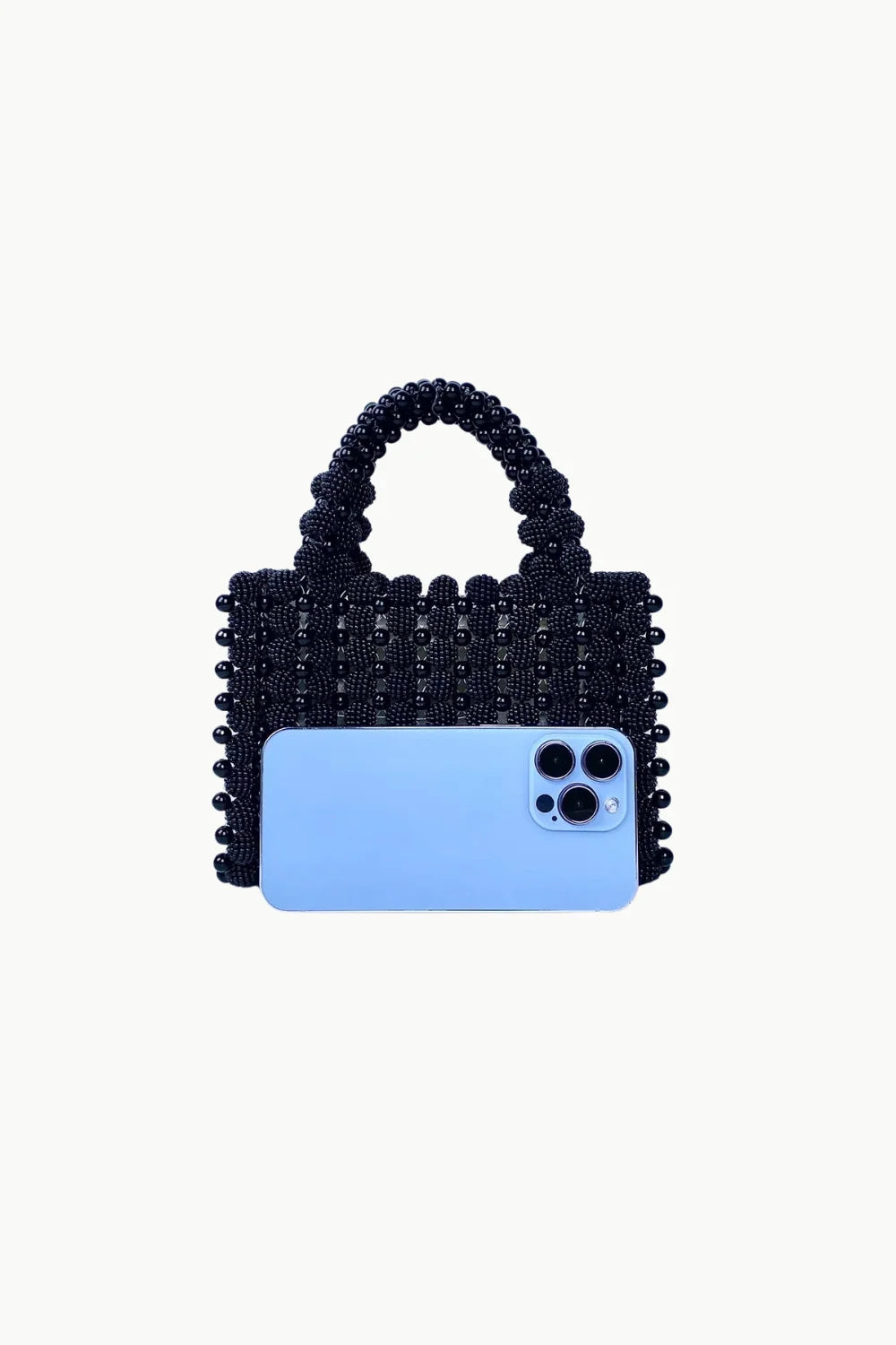 Black beaded evening handbag with light blue smartphone in front, stylish accessory