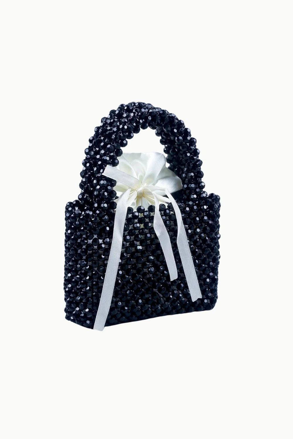 Black beaded handbag with white drawstring closure and ribbon tie for elegant style
