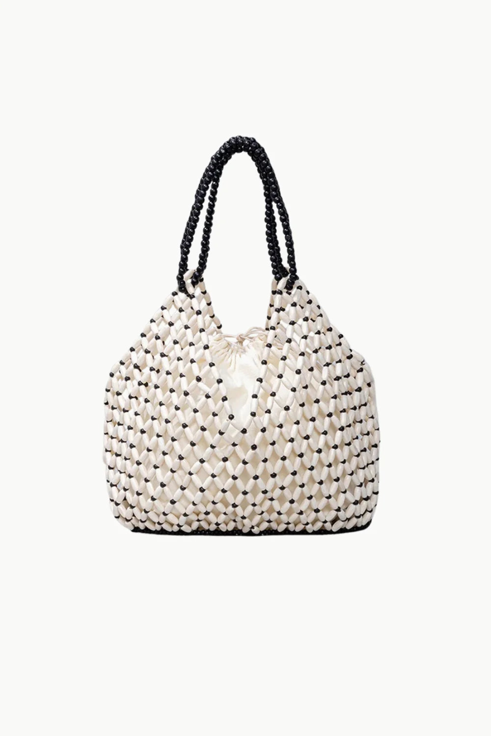 White beaded tote bag with black wooden beaded handles for stylish accessory use