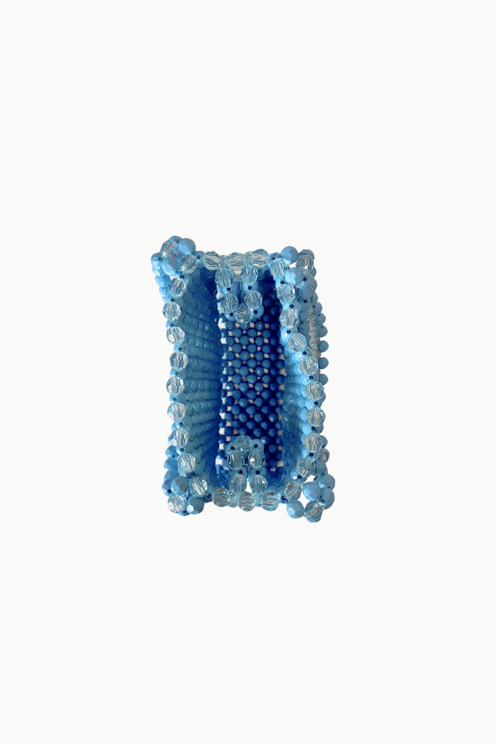 Blue beaded handbag with structured cylindrical shape, perfect for stylish occasions