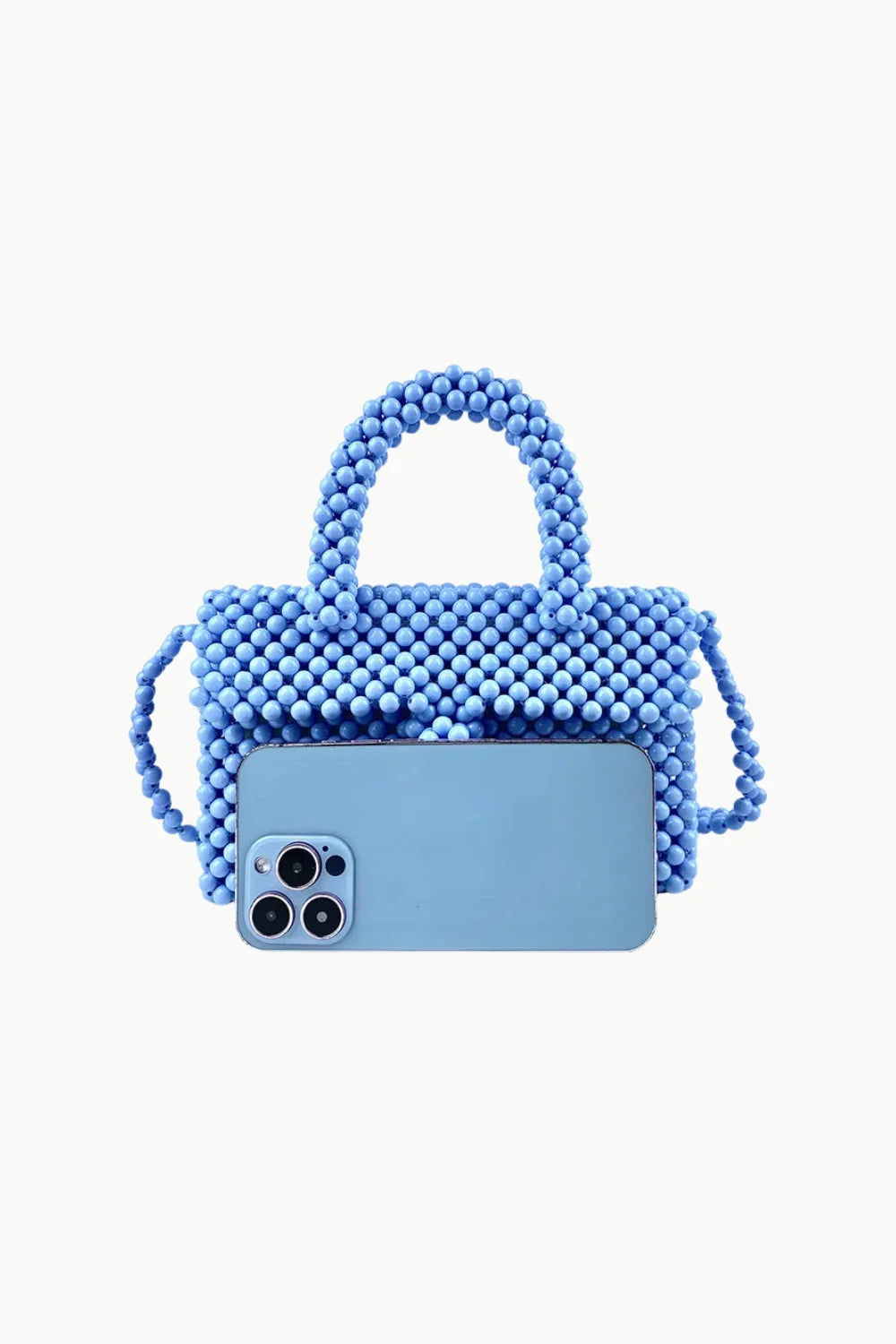 Light blue beaded shoulder bag with top handle, detachable strap, and magnetic snap closure
