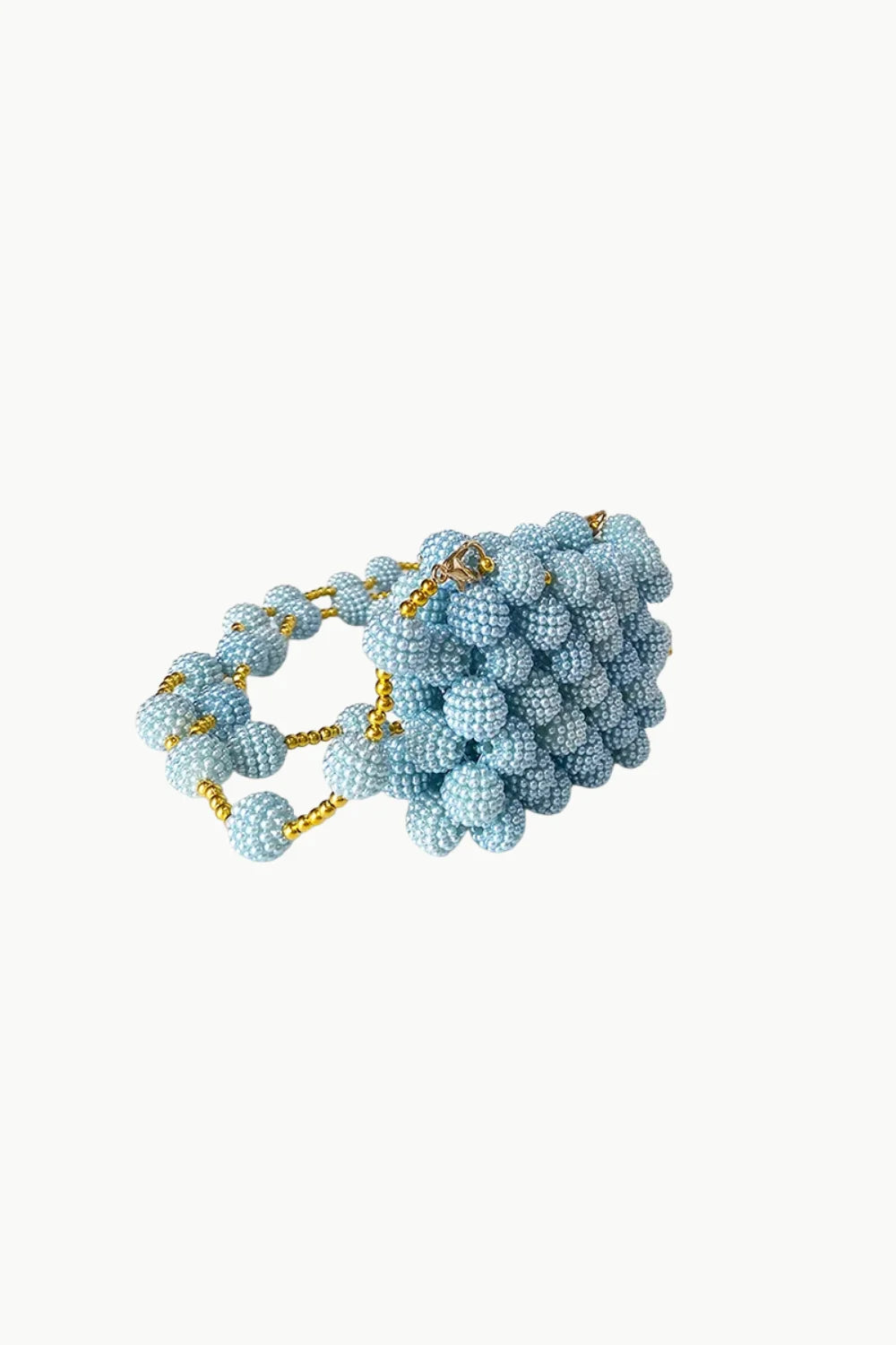 Light blue beaded handbag with gold chain handle, perfect for a blue mini beaded bag