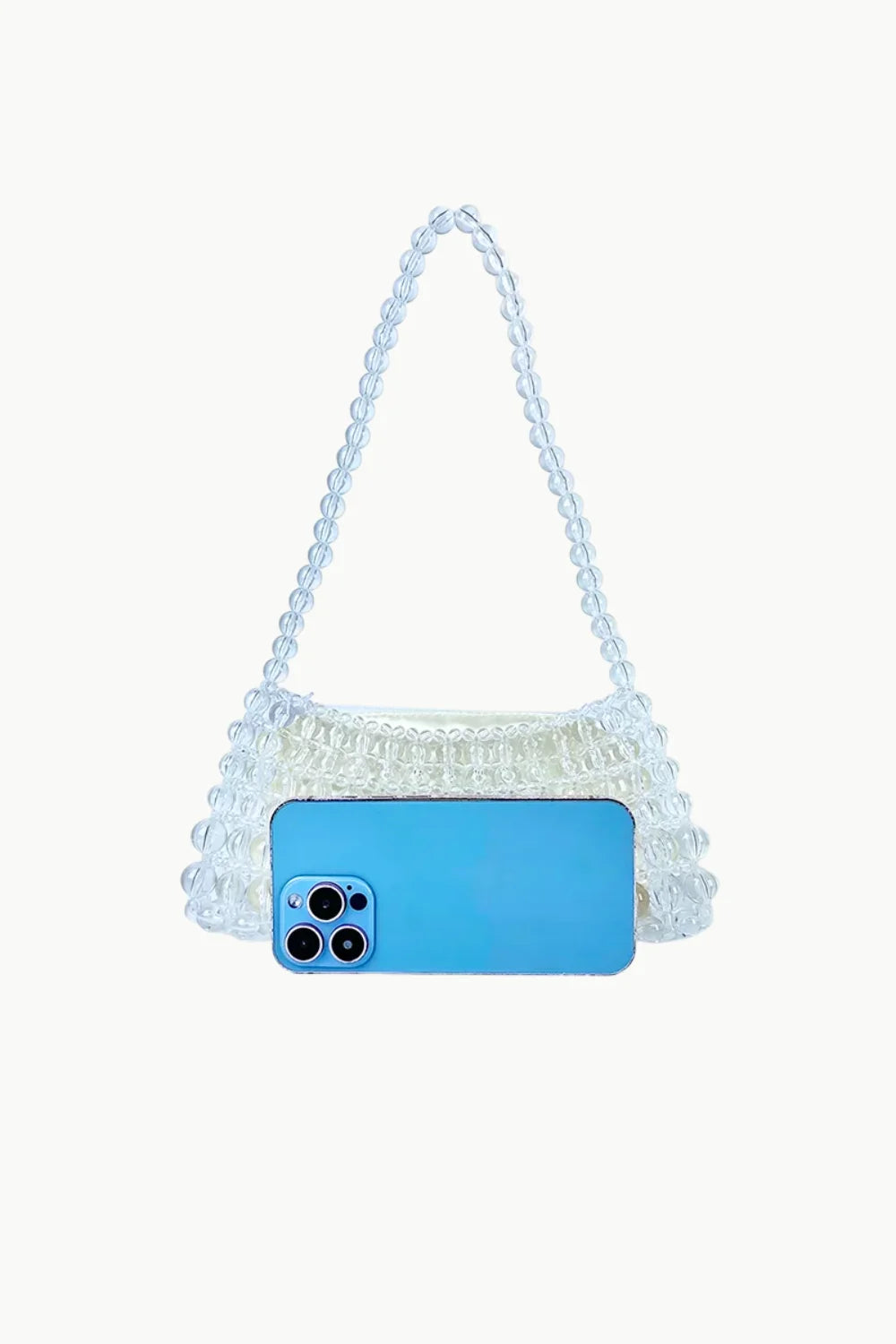 Clear beaded shoulder bag with blue smartphone inside, stylish beaded shoulder bag accessory