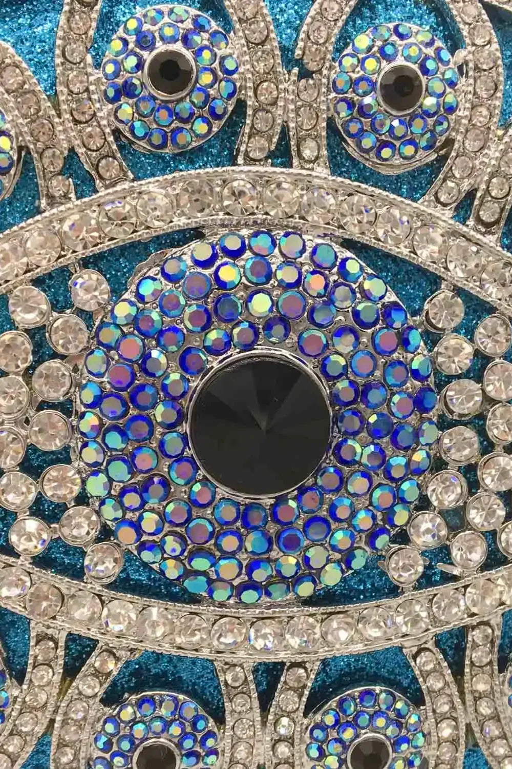 Sparkling evil eye charm with rhinestones on silver-toned beaded bag for protection
