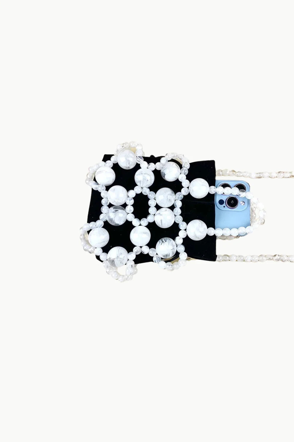 Black phone holder with white beaded net and pearl strap in gold beaded bucket bag