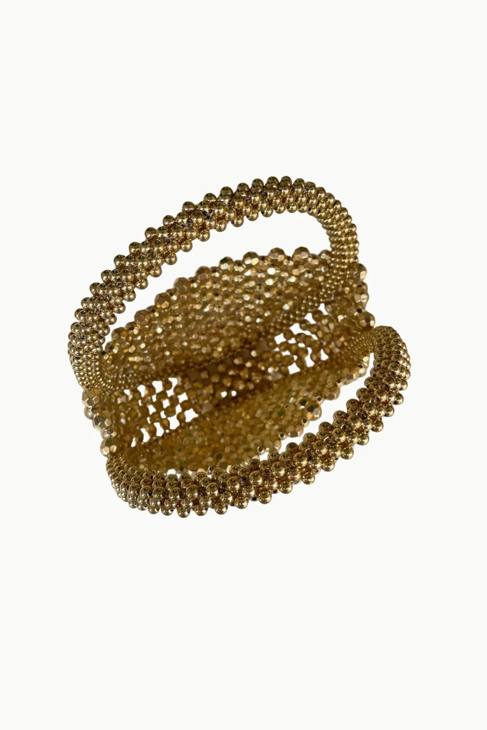 Gold beaded bracelet displayed with a gold beaded handbag accessory for stylish elegance