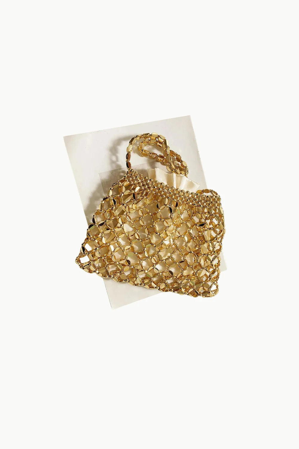 Shimmering metallic beaded shoulder bag with structured handle for stylish occasions