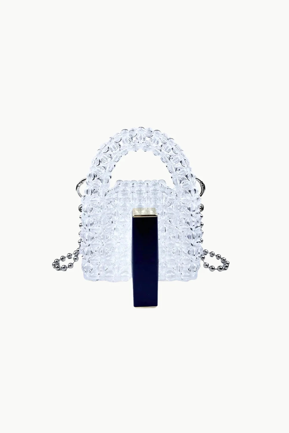 Transparent pearl beaded tote bag with silver chain strap and dark blue lipstick inside