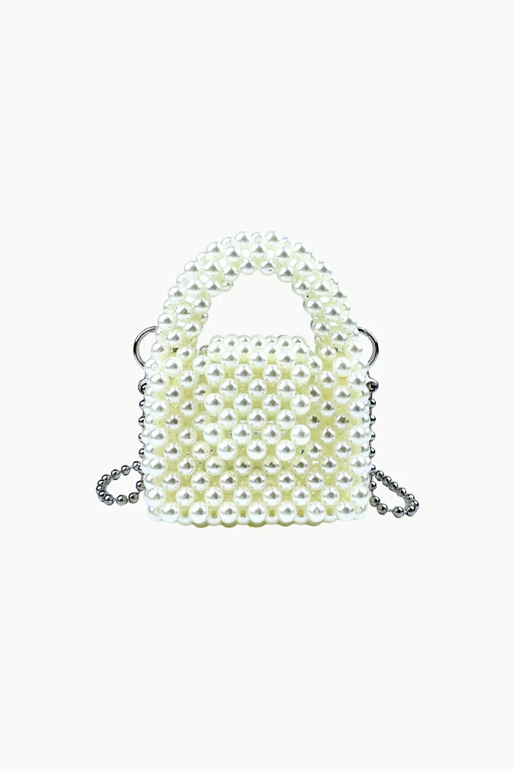 White beaded faux pearl handbag with silver chain strap, perfect for a pearl bag look