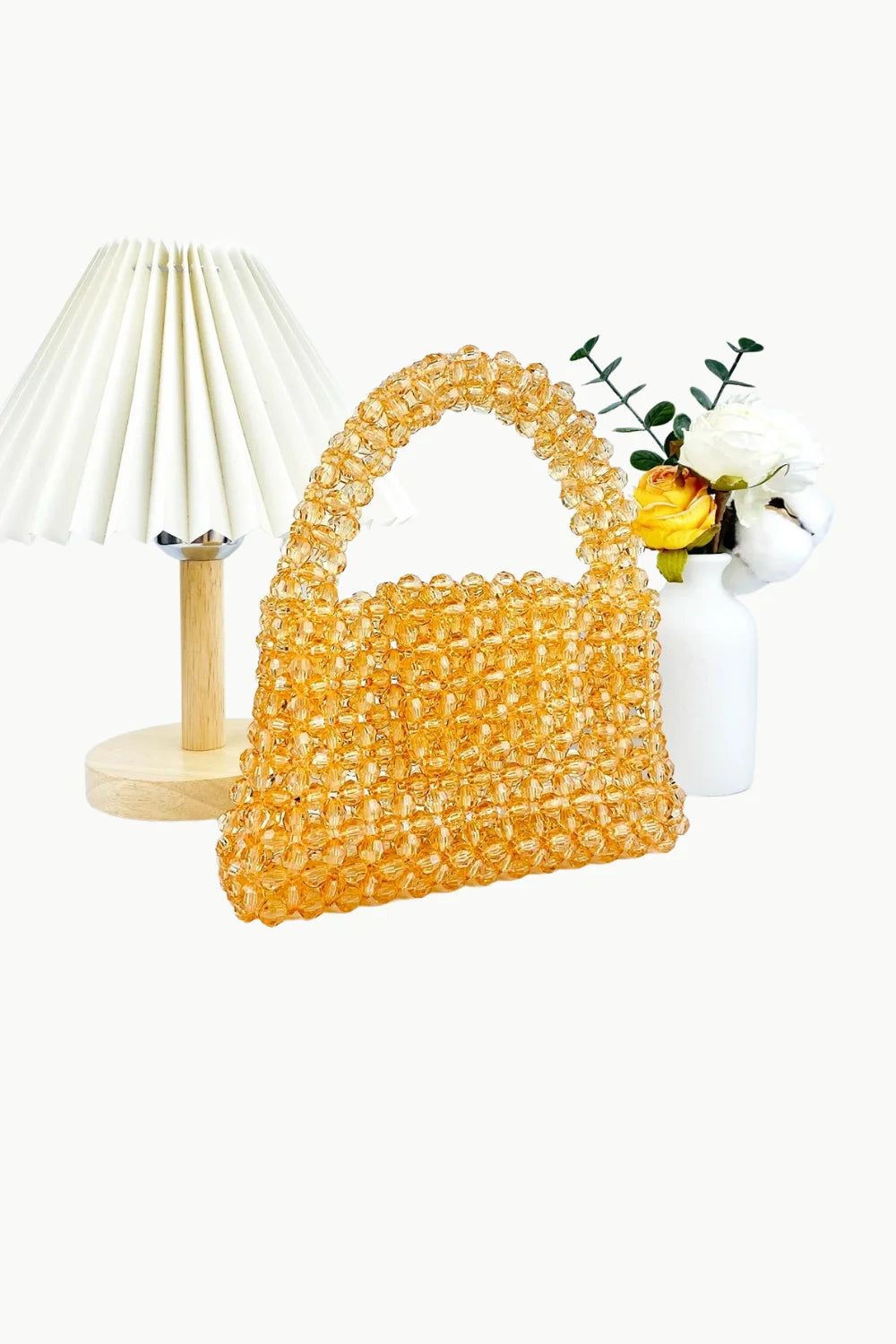 Shimmering orange beaded bag with top handle, stylish orange beaded bag accessory