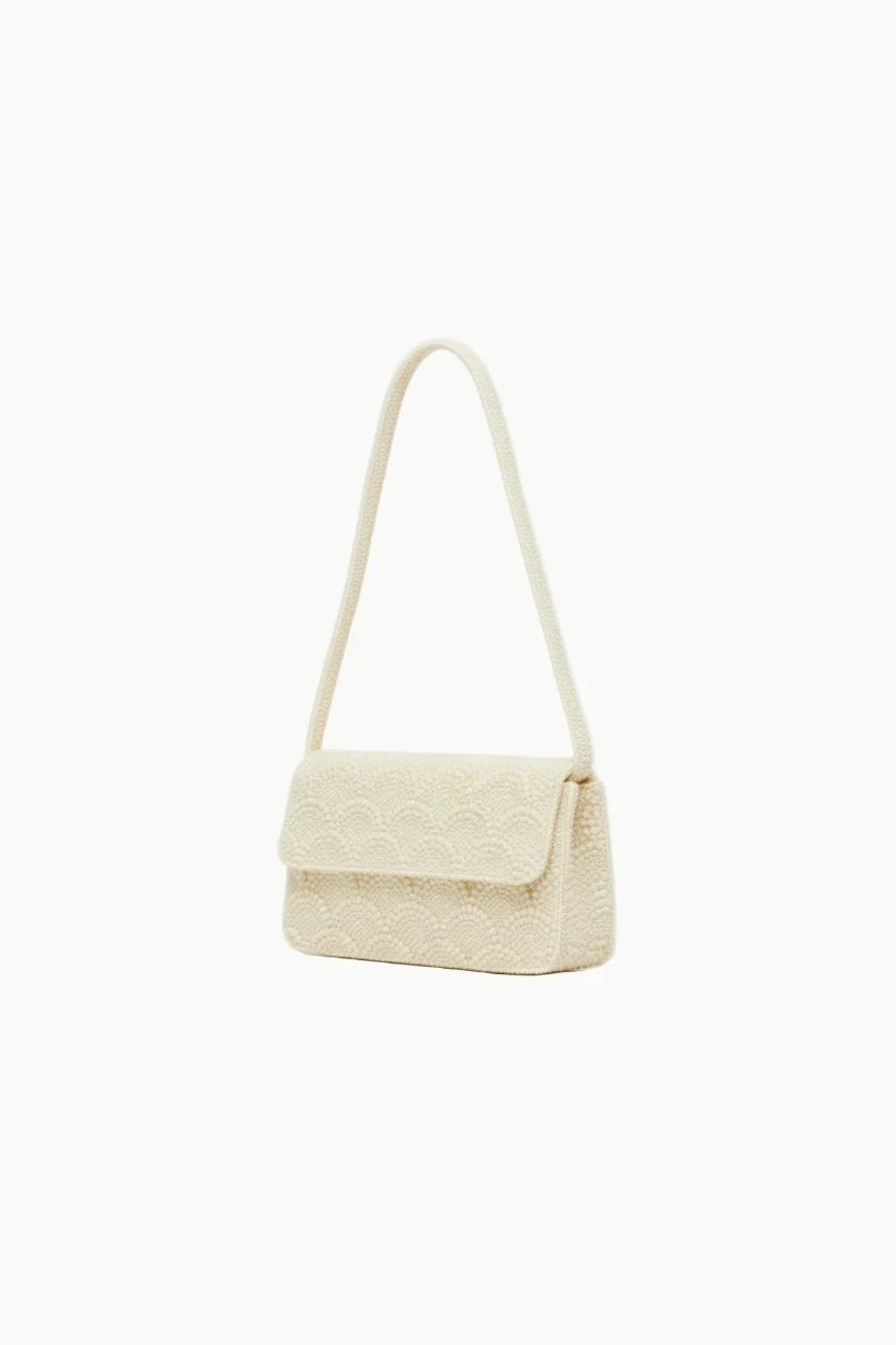 Cream-colored crocheted Pearl Beaded Handbag with braided strap, stylish beaded handbag