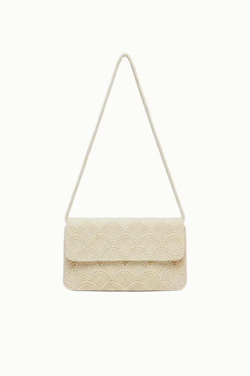 Cream-colored pearl beaded handbag with scallop pattern and thin shoulder strap